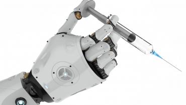 "robotic hand holding syringe“